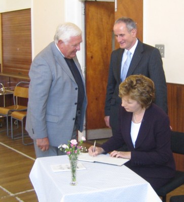 President McAleese signs the Visitors' Book